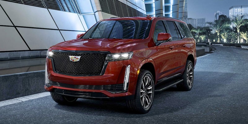 Red Car running on road